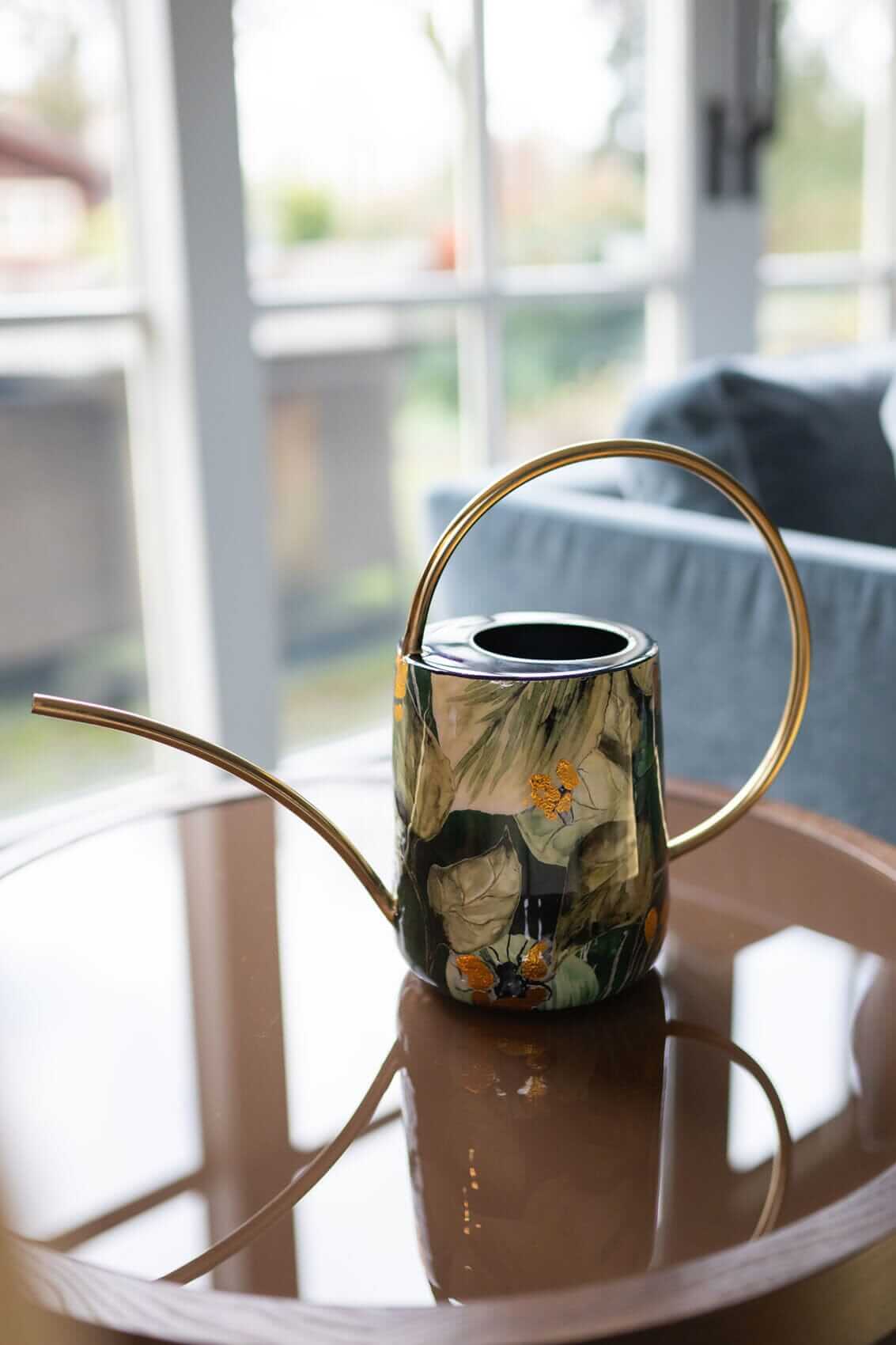 Lammie Bee Green designer watering can, emerald green metal with hand-applied leaf and bee motif and gold embellishments, H38cm, UK